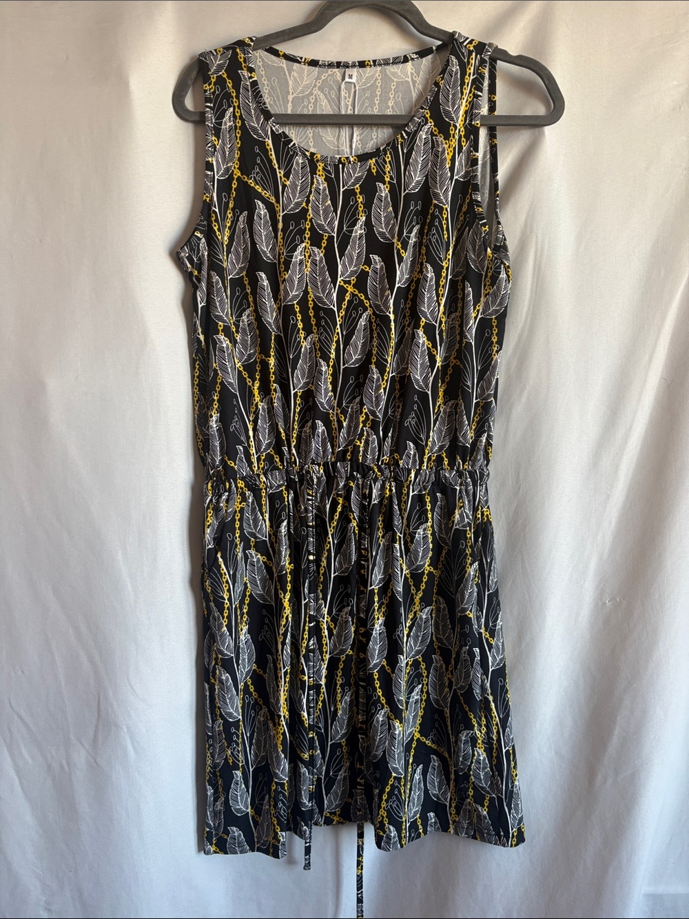 Sleeveless Black Mini Dress with White Feather & Yellow Chain Print